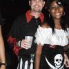 Janet Silvera Photo
 
 Pirate Michael Mac and his wench, Latoya Wilson are in sync at Groovy Grouper's Halloween party on  Saturday night in Montego Bay.