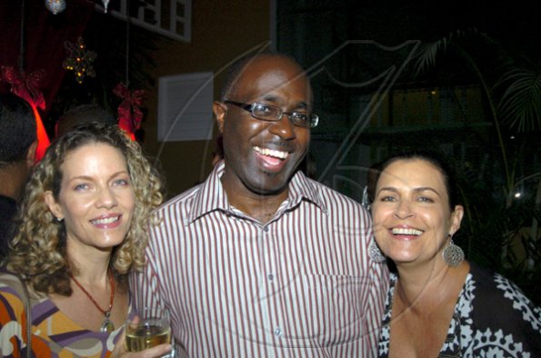 Winston Sill / Freelance Photographer
Guardsman Group Limited host Christmas Party, Held at their Head Office, Old Hope Road on Friday December 11, 2009. Here are Suzie Benjamin (left); Gary Allen (centre); and Cindy Breakspeare-Bent (right).