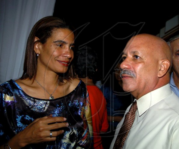 Winston Sill / Freelance Photographer
Guardsman Group Limited host Christmas Party, Held at their Head Office, Old Hope Road on Friday December 11, 2009. Here are Renee Menzies-McCallum (left); and Com. George Overton (right).
