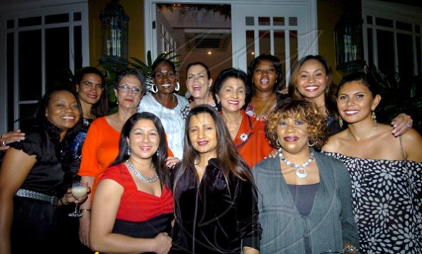 Winston Sill / Freelance Photographer
Guardsman Group Limited host Christmas Party, Held at their Head Office, Old Hope Road on Friday December 11, 2009. Here are, back row from left are Caron Martin; Renee Menzies-McCallum; Sonja Sutherland-Dumetz; Shirma Rogers; Cindy Breakspare-Bent; Valerie Juggan-Brown; Norda Brown and KerriAn Shirley. 
Front row, from left are Sheraine Murray; Sheila Benjamin-McNeill; Audrey Miller; and Marie Josephs.