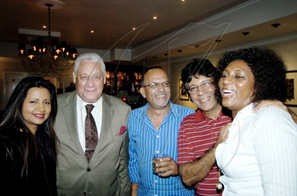 Winston Sill / Freelance Photographer
Hanging out (from left) are Sheila Benjamin-McNeill; Transport Minister Mike Henry; Rajiv Bakshi; Kenny Benjamin; and Dawn Henry.

Guardsman Group Limited host Christmas Party, Held at their Head Office, Old Hope Road on Friday December 11, 2009.