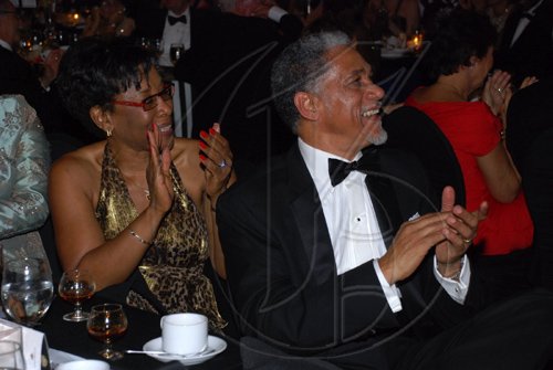 Colin Hamilton/Freelance Photographer PSOJ Hall of Fame on December 7, 2010 - DR Claudette Cooke and husband Maj. Richard Cooke applaud the night's events.