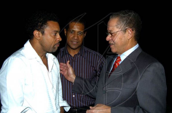 Winston Sill / Freelance Photographer
Prime Minister Bruce Golding (right) has a few words for Shaggy (left) while Tanny Shirley, chairman of the South East Regional Health Authority looks on. 




Ministry of Health host Thank You Reception for Shaggy Foundation and Sponsors of the Shaggy and Friends Concert, held at Bracknell Avenue, Jack's Hill on Monday night January 4, 2010.