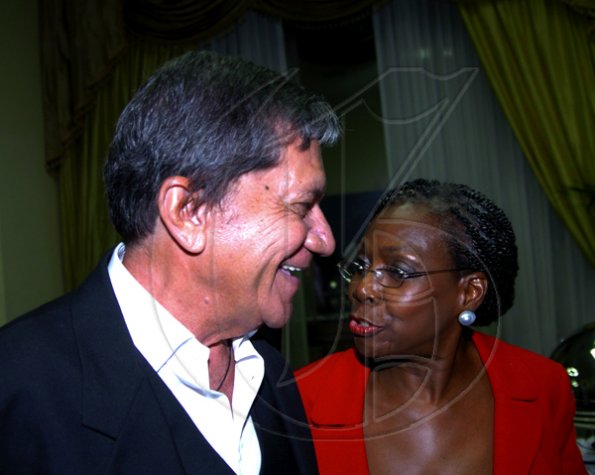 Winston Sill / Freelance Photographer
Hilton Kingston Hotel host Farewell Reception, held at Hilton Hotel, New Kingston on Tuesday night June 29, 2010. Here are Frank Rosheuvel (left); and Lorna Golding (right).