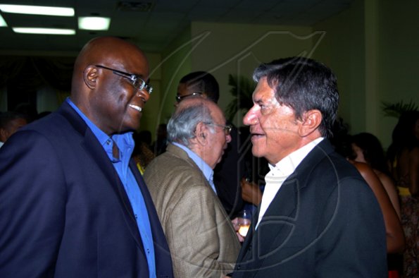 Winston Sill / Freelance Photographer
Hilton Kingston Hotel host Farewell Reception, held at Hilton Hotel, New Kingston on Tuesday night June 29, 2010. Here are Brian George (left); and Frank Rosheuvel  (right).