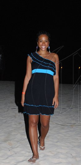 Janet Silvera Photo
 
Tourism's fabulous Nicole Haughton created waves in this dress at the Iberostar Sports Invitational beach party in Rose Hall, Montego Bay on Monday night.