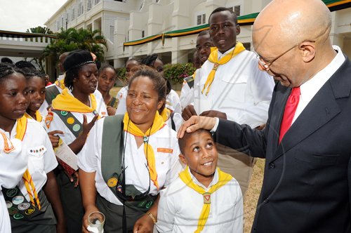 Rudolph Brown/Chief Photographer
Sir Patrick Allen, Governor General, in discussion with the Emerald Pathfinder Club from May Pen at the Independence Day Ceremony at Kings House on Thursday, August 6-2009