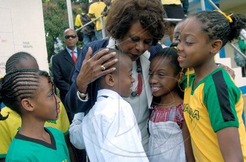 Ricardo Makyn/Staff Photographer.Students of the  Craighton Primary School  in the Red Light District in Rural St Andrew with United States Ambassador to Jamaica Pamela Bridgewater at the Schools Jamaica Day on Friday 25.2.2011.