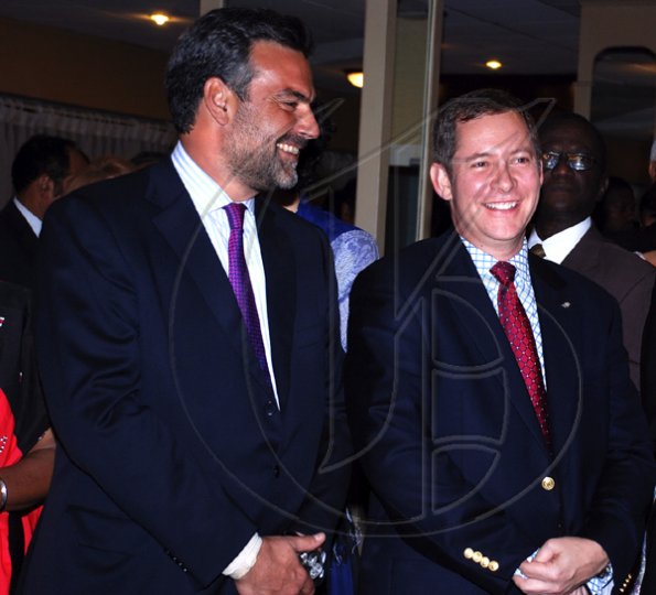 Colin Hamilton/Freelance Photographer
Spanish Ambassador Jesus Silva shares a joke with BNS CEO Bruce Bowen during the Embassy of Japan hosted a reception in honour of the 76th birthday and 20th year of the reign of the Emperor Akhito at the Pegasus Hotel on December 9, 2009.