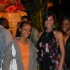 Yendi Phillips is sandwiched by two of her fans.JPG