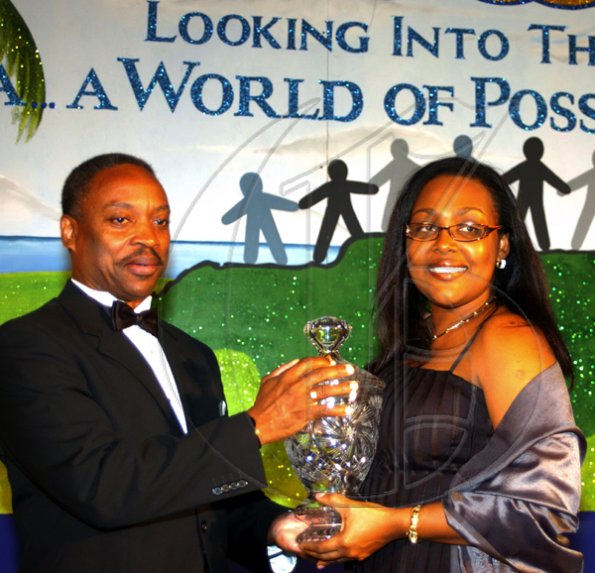 Winston Sill / Freelance Photographer
BUSINESS DESK:---Jamaica Chamber of Commerce (JCC) 28th Annual Dinner and Awards Ceremony, held at The Jamaica Pegasus Hotel, New Kingston on Thursday March 11, 2010. Here President of JCC, Milton Samuda (left) present Grace Burnett (right), of Allied Insurance Brokers Limited the Best of Chamber: Medium Enterprise Award.