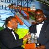 Winston Sill / Freelance Photographer
BUSINESS DESK:---Jamaica Chamber of Commerce (JCC) 28th Annual Dinner and Awards Ceremony, held at The Jamaica Pegasus Hotel, New Kingston on Thursday March 11, 2010. Here Milton Samuda (left), President, JCC  presents Bernard Williams (right), of Care Furniture Company Limited with the Best of Chamber: Small Enterprise Award.