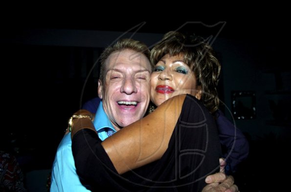 Winston Sill / Freelance Photographer
Talk about a hug!
Michelle Bovell and Charles Hanna give each other a hug tolas a lifetime at the farewell reception for Jesus Silva


****************************************************************The Consular Corps of Jamaica host Farewell Reception for Spanish Ambassador, Jesus Silva and his wife Sara, held at Seymour Avenue on Saturday night September 11, 2010.