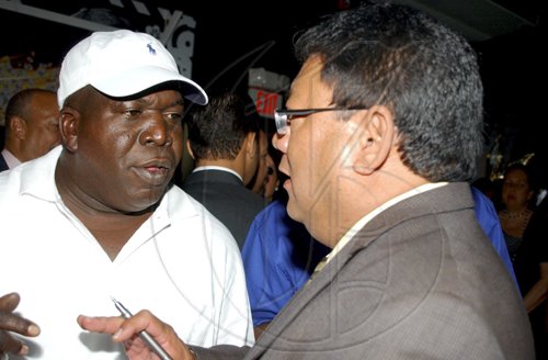 Winston Sill / Freelance Photographer
Supreme Ventures Limited launch party for the "Super Lotto Game", held at Pure Plush Lounge, Trinidad Terrace, New Kingston on Tuesday August 25, 2009. Here are Barrington Levy (left); and Paul Hoo (right).