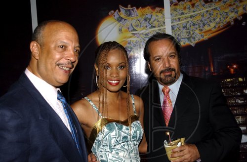 Winston Sill / Freelance Photographer
Supreme Ventures Limited launch party for the "Super Lotto Game", held at Pure Plush Lounge, Trinidad Terrace, New Kingston on Tuesday August 25, 2009. Here are Elvin Diaz (left); Renee Lee (centre); and Jose b. Guzman (right).