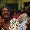 Anthony Minott/Freelance Photographer Two golden agers enjoy Bridgeport High School choir performance during Woody's Restaurant/Transjamaica Highway  sponsored Portmore Mayor's Senior Citizens Christmas treat at the Portmore HEART Academy on Wednesday, December 22, 2010. Over 200 Senior Citizens were feted. Other sponsors include Sovereign Supermarket, TDK tours, and YP Seaton.