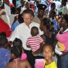 JIS Prime Minister, the Hon Bruce Golding, is the centre of attention at Saturday’s Christmas Treat for children at the Tivoli Gardens community centre on Saturday, December 18. Children and parents were treated at several location locations in his West Kingston constituency, including Tivoli, Fletcher’s Land and Denham Town.