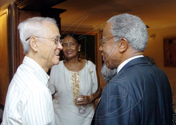 Winston Sill/Freelance Photographer
Karl Hendrickson (left) welcomes Sir George Alleyne, UWI Chancellor while Dorothy Pine-McLarty looks on.

Oliver Clarke's reception held at Millsborough on Saturday November 7, 2009.