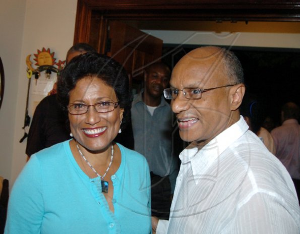 Winston Sill/Freelance Photographer
Professor Trevor Munroe beams with wife Ingrid.

Oliver Clarke's reception held at Millsborough on Saturday November 7, 2009.
