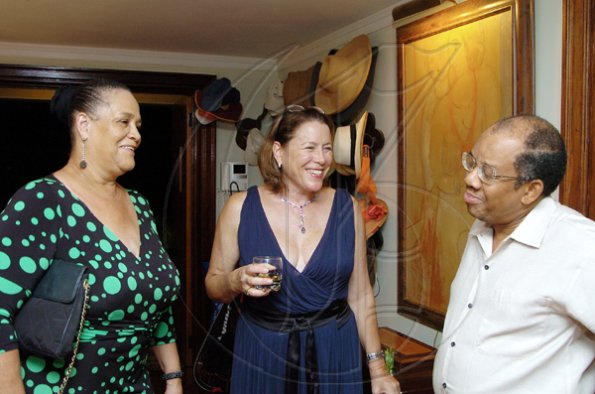 Winston Sill/Freelance Photographer
Former Gleaner Editor-in-Chief Wyvolyn Gager (left) and husband Trevor Patterson joke with Monica Ladd.

Oliver Clarke's reception held at Millsborough on Saturday November 7, 2009.