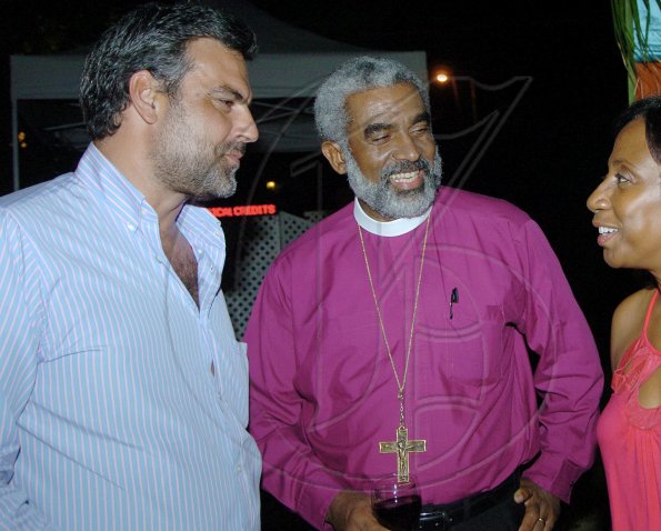 Winston Sill/Freelance Photographer
Bishop Robert Thompson (second left) jokes with Sandra Glasgow while Spanish Ambassador Jesus Silva (left) and British High Commissioner Jeremy Cresswell look on.

Oliver Clarke's reception held at Millsborough on Saturday November 7, 2009.