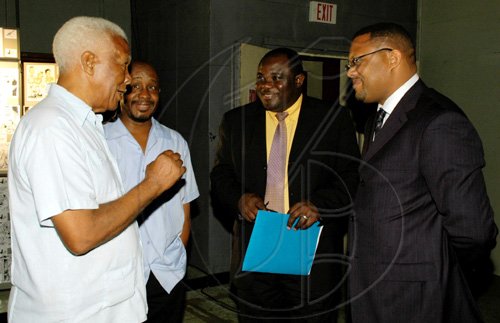 Colin Hamilton/Freelance Photographer
From left: Desmond Elliott, Byron Buckley Press Association of Jamaica president; Cordell Green, executive director of the Broadcasting Commission and Leighton Thomas, chief executive officer of the Public Broadcasting Corporation of Jamaica (PBCJ), engage one another in conversation. 


******************************************************* Wednesday June 17, 2009.