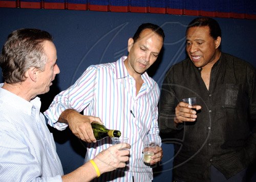Winston Sill / Freelance Photographer
It's all about the wine, as the doctors say a glass of red wine daily is good of the heart and these men from left to right: Paul Hanworth, William Tavares- Finson and Baz Naar  is having a drink, doctor's order.































































rPan Caribbean host Cocktail Reception for Harry Potter movie Premiere, held at Carib Cineplex, Cross Roads on Tuesday July 21, 2009.