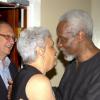 Winston Sill / Freelance Photographer
Former Prime Minister P.J. Patterson (right) gets a warm hug from Shirley Williams while R Danny Williams looks on.

Reception for  for his Caricom Award, held at the Jamaica Pegasus Hotel, New Kingston on Monday July 27, 2009.