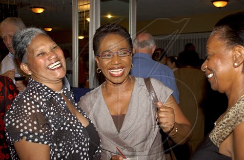 Winston Sill / Freelance Photographer
Cracking up are (from left) Evelyn Sangster Barnes, Louise Wilson and Effie Lakasingh at the reception for former Prime Minister PJ Patterson on his Caricom Award, held at the Jamaica Pegasus Hotel, New Kingston on Monday July 27, 2009.