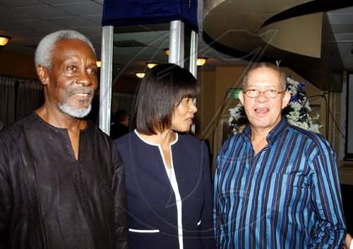 Winston Sill / Freelance Photographer
The big three are caught up in the mood of the moment (from left) former Prime Minister PJ Patterson, Opposition Leader Portia Simpson Miller and Prime Minister Bruce Golding. 



Patterson was feted for receiving the Order of the Caribbean Community at a reception held at the Jamaica Pegasus Hotel, New Kingston last Monday.


 July 27, 2009.