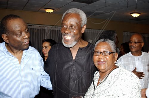 Winston Sill / Freelance Photographer
Member of Parliament Derrick Smith (left) and wife Karlene, offer their congratulations to P. J. Patterson.

****************************************************************** Reception for former Prime Minister PJ Patterson for his Caricom Award, held at the Jamaica Pegasus Hotel, New Kingston on Monday July 27, 2009.