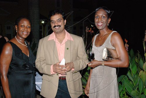 Janet Silvera Photo
From left:  Resident Magistrate Winsome Henry, Indies Pharma's Dr. Guna Muppuri and Whitter Village's Angella Whitter, spend time together.

************************************************************* the Pioneers of Prosperity Awards ceremony at the Half Moon in Montego Bay last Friday night.