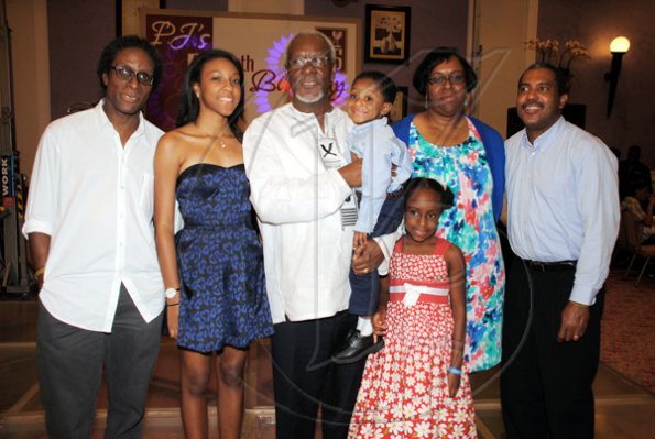Janet Silvera
The Patterson family from left: Richard Patterson, his daughter Gabrielle, former prime minister P.J. Patterson holding grandson Andrew  Hibbert, Sharon Patterson, Horace Hibbert and in front Breanna Hibbert.