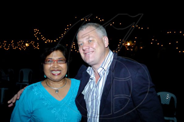 Winston Sill / Freelance Photographer
We aren't the only ones who haven't seen Digicel's David Hall for a while so PROComm boss Jean Lowrie-Chin was among the first to welcome him to the party.
Christmas Party, held at Kingsway on Saturday night December 5, 2009.