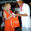 Winston Sill / Freelance Photographer
D'Arcey Crooks gets his prize from Digicel's Antonia Graham.

PRO Comm Christmas Party, held at Kingsway on Saturday night December 5, 2009.