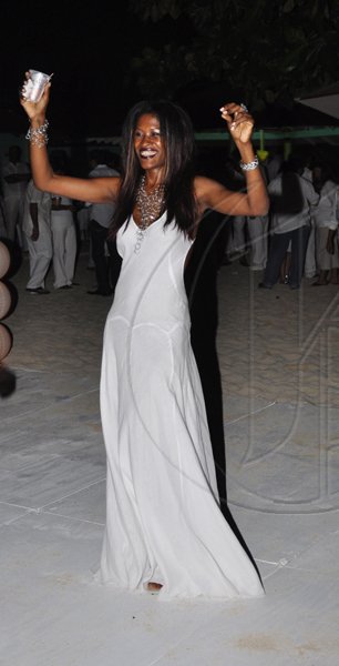 Janet Silvera Photo
 
Fashionista Karlene Kellond having a whale of a time at Rajeesh Kripalani's 40th birthday party at Cornwall Beach in Montego Bay last Saturday night.