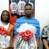 Top three winners of the Red Label Wine Christmas cake competition  with their gift baskets courtesy of J. Wray & Nephew Limited. They are (from left): Stephanie Richards (third place), Kevin Stewart (winner) and Lorna Wilson (second place).
*****************************************************************************************
Peta-Gaye Clachar/Freelance Photographer
RL Christmas Cake contest at the Gleaner on Friday, December 11, 2009.