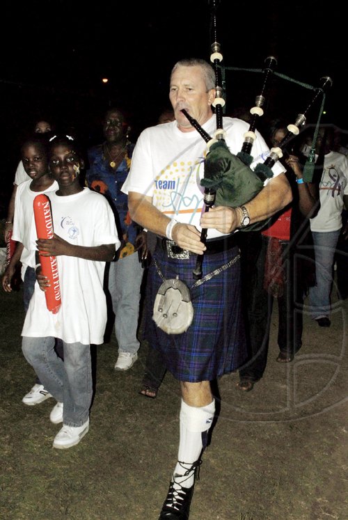 Colin Hamilton/ Freelance Photographer
Bagpiper Tom Conner leads the way to Relay for Life.

********************************************************************** June 13
