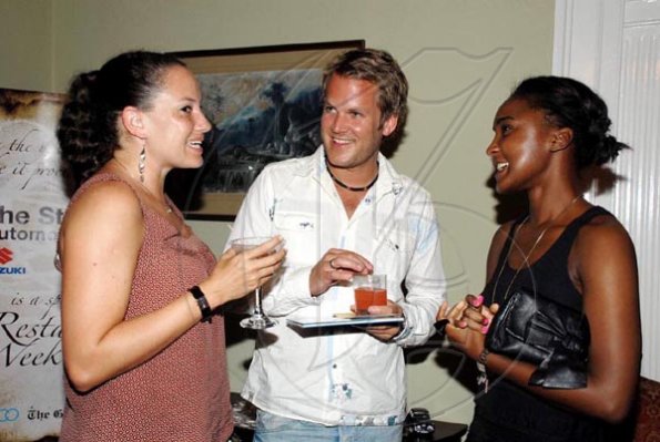 Colin Hamilton/Freelance Photographer
From left, Linley Kristofferson; Bjorn?Kristofferson and Martine Morgan enjoy each other's company

*******************************************************************during the Restaurant Week launch at Devon House on Thursday October 1, 2009.