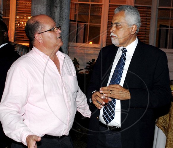Colin Hamilton/Freelance Photographer
Kent LaCroix and Larry Watson chats during the 
Restaurant Week launch at Devon House on Thursday October 1, 2009.