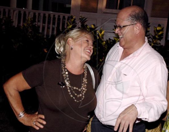 Colin Hamilton/freelance photographer
Larry Watson has Eva Myres tickled pink.

****************************************************** during the
Restaurant Week launch at Devon House on Thursday October 1, 2009.