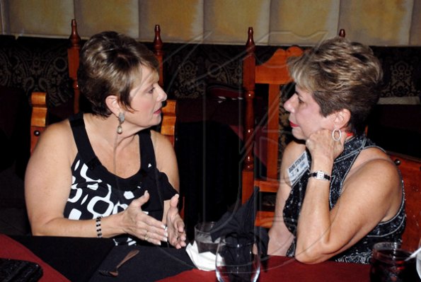Colin Hamilton/freelance photographer
Becky Stockhousen  (left) engages in a pre-dinner chat with Diana Stewart of Stewart's Auto, one of the sponsors of this year's Gleaner sponsored Restaurant Week.

**************************************************************** at the Marketplace Food Court on Wednesday November 11, 2009.