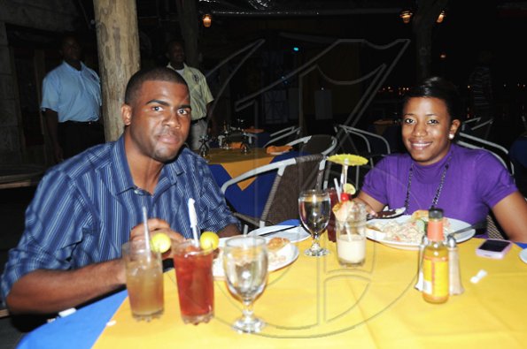 Sheena Gayle photo

Clevon Watson (left) enjoys his evening out with Racquel Rowe during Restaurant Week at Pier One on the Waterfront in Montego Bay.