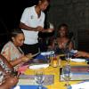 Sheena Gayle/Gleaner Writer
(clockwise) Marsha Turnispeed, Tisa Sommerville tries to decide what to have from the Restaurant Week menu at Pier One on the Waterfront in Montego Bay as waiter Lloyd Calvert listens attentively as Kenya Turner, Charlain Bland and Nikki Brinson make their order.