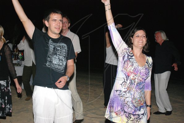 Janet Silvera Photo

Joachim Mayershofer (left) and Laura Mapone dance to the sounds of Byron Lee and the Dragonnaires band during a beach party at RIU Ocho Rios for  some 100 media practicioners who were on the island for the TUI educational summer programme.