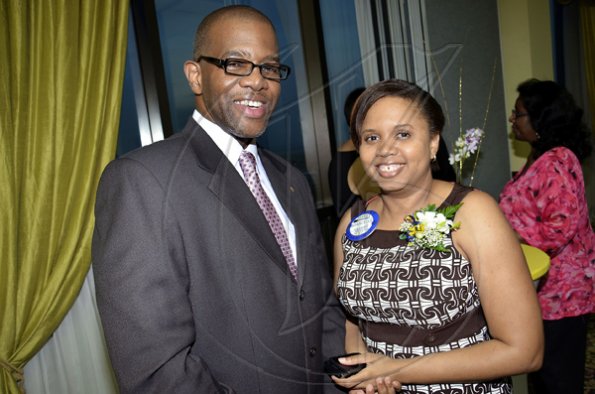 Rudolph Brown/Photographer
Gilroy Graham (left) and Marcelle Smart at The Rotary Club of St. Andrew North's 25th annual installation ceremony at the Wyndham Hotel in New Kingston on Monday, June 27, 2011.