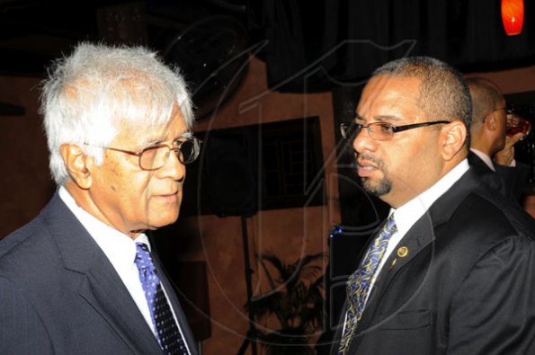 Rudolph Brown/Photographer
Cecil Beharry and David T. Brown at Rotary Club of St. Andrew North Installation and investiture of the incoming administration at RibKage, 12 Braemar Avenue on Monday, June 28-2010.