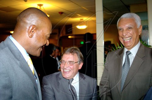 Winston Sill / Freelance Photographer
Russian Ambassador Victor Zotin (centre) shares a hearty laugh with Dr Ronald Robinson (left) state minister for Foreign Affairs and Foreign Trade; and Colombian Ambassador Emilio Ventura Diaz Mejia.


******************************************************************************* host Reception to celebrate the 35th Anniversary of Diplomatic Ties between Jamaica and Russia, held at the Jamaica Pegasus Hotel, New Kingston on Tuesday March 16, 2010.