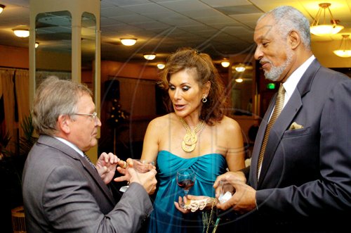 Winston Sill / Freelance Photographer
Russian Ambassador Victor Zotin (left) jokes with Mexican Ambassador Leonora Rueda and Ambassador Douglas Saunders.
*****************************************************************

 host Reception to celebrate the 35th Anniversary of Diplomatic Ties between Jamaica and Russia, held at the Jamaica Pegasus Hotel, New Kingston on Tuesday March 16, 2010.