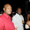 Rudolph Brown/Photographer
Randolph McLean,(left) Knutsford Branch Manager chat with Calvin Smith, (right) and John Tulloch at the Sagicor christmas party at the Office car park in New Kingston on Saturday, December 12-2009